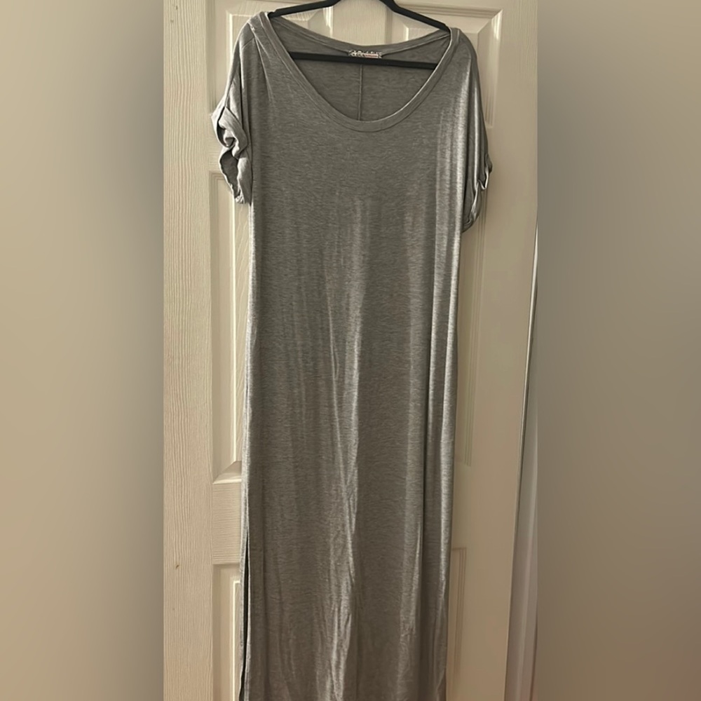 Short sleeve dress with slits on the size.  Size Large.
